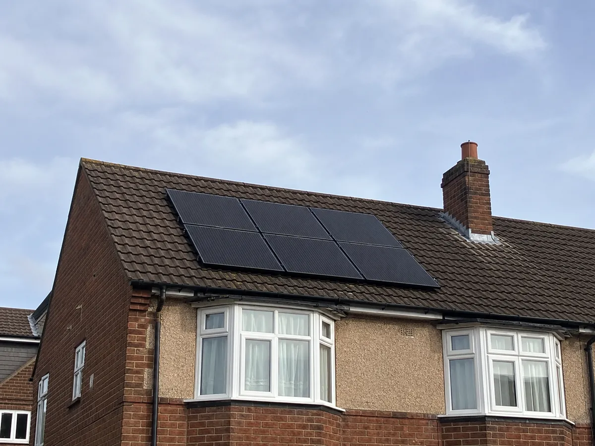 Solar panels installed on the roof of a semi-detached home